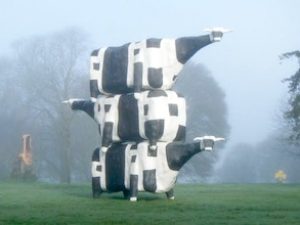 John Kelly: Three Cows in a Pile