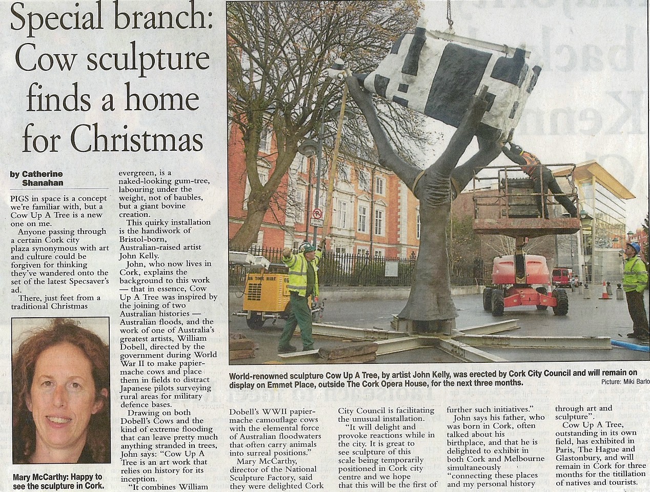 Catherine Shanahan, ‘Special ranch: Cow sculpture finds a home from Christmas’; newspaper article with an image of Cow up a Tree being placed outside the Crawford Art Gallery in Cork, plus a portrait photo of Mary McCarthy, director of the National Sculpture Factory
