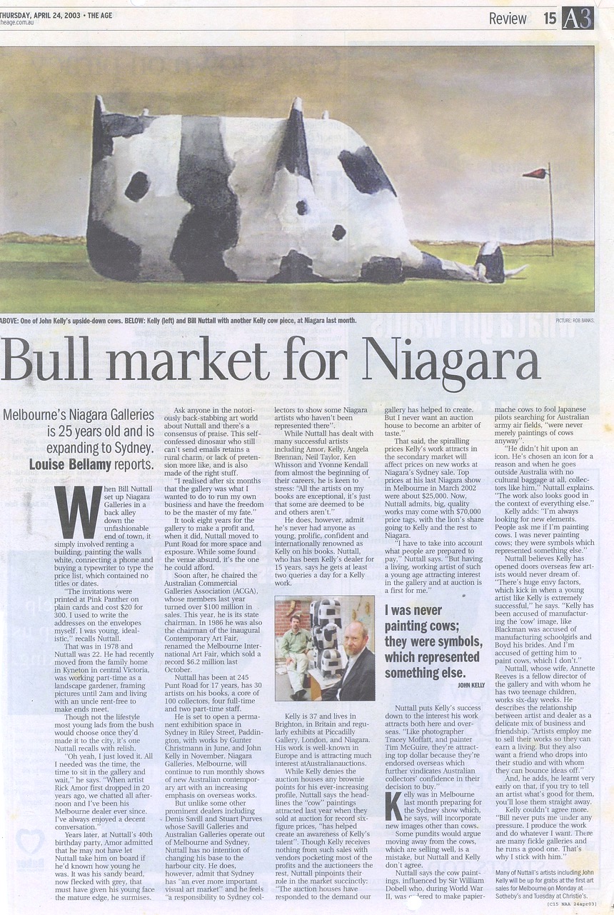 The Age, 24 April 2003; article by Louise Bellamy titled ‘Bull market for Niagara’; the article is primarily about Niagara Galleries; at the top is an image of “one of John Kelly’s upside-down cows” paintings