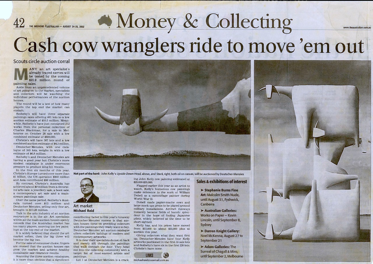 Article in The Australian, 24-25 August 2002; title is ‘Cash cow wranglers ride to move ’em out’; text plus two images of John Kelly paintings
